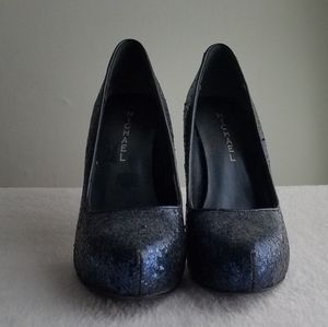 Almond toed navy sparkly pumps